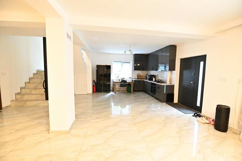 Kitchen with dark cabinets